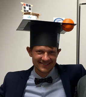 Jonas Schlund with graduation cap