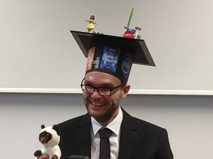 Thomas Deinlein with graduation cap